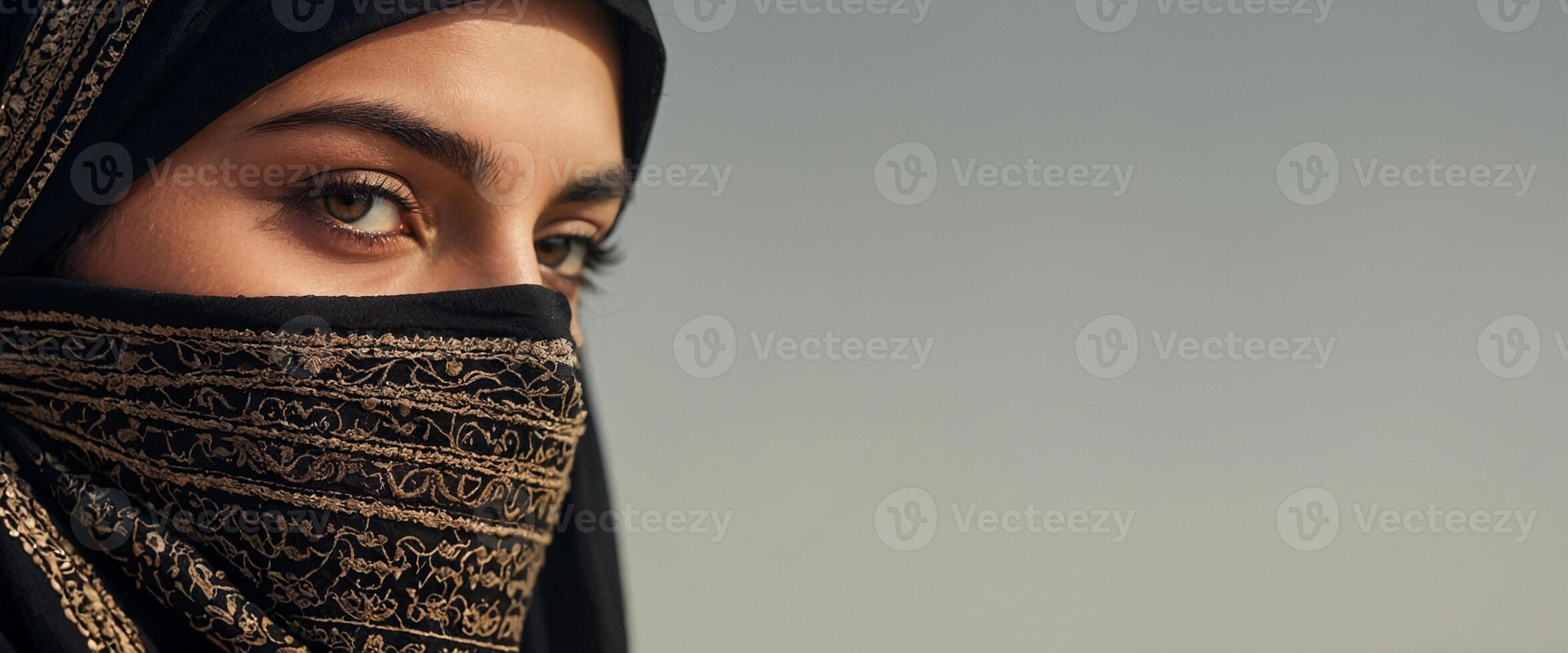 A woman wearing a head scarf photo