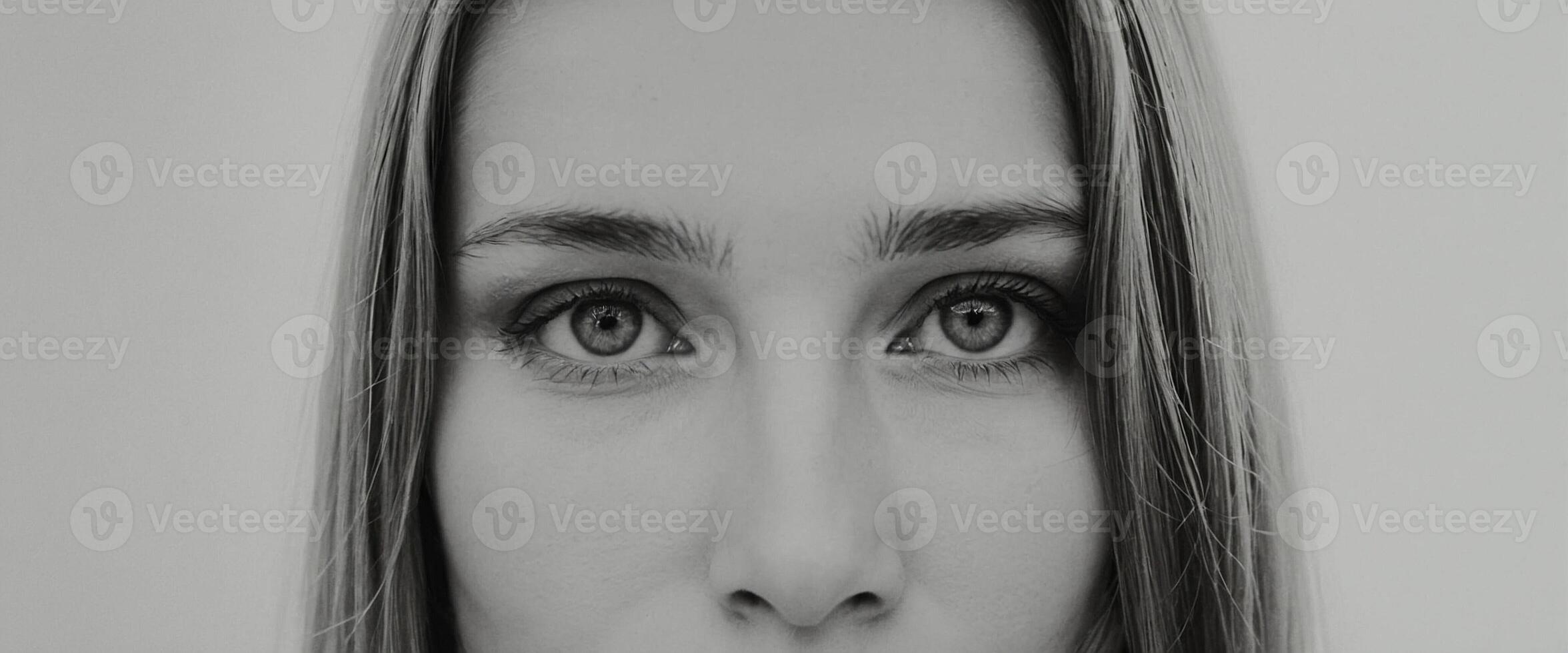 A black and white photo of a woman's face