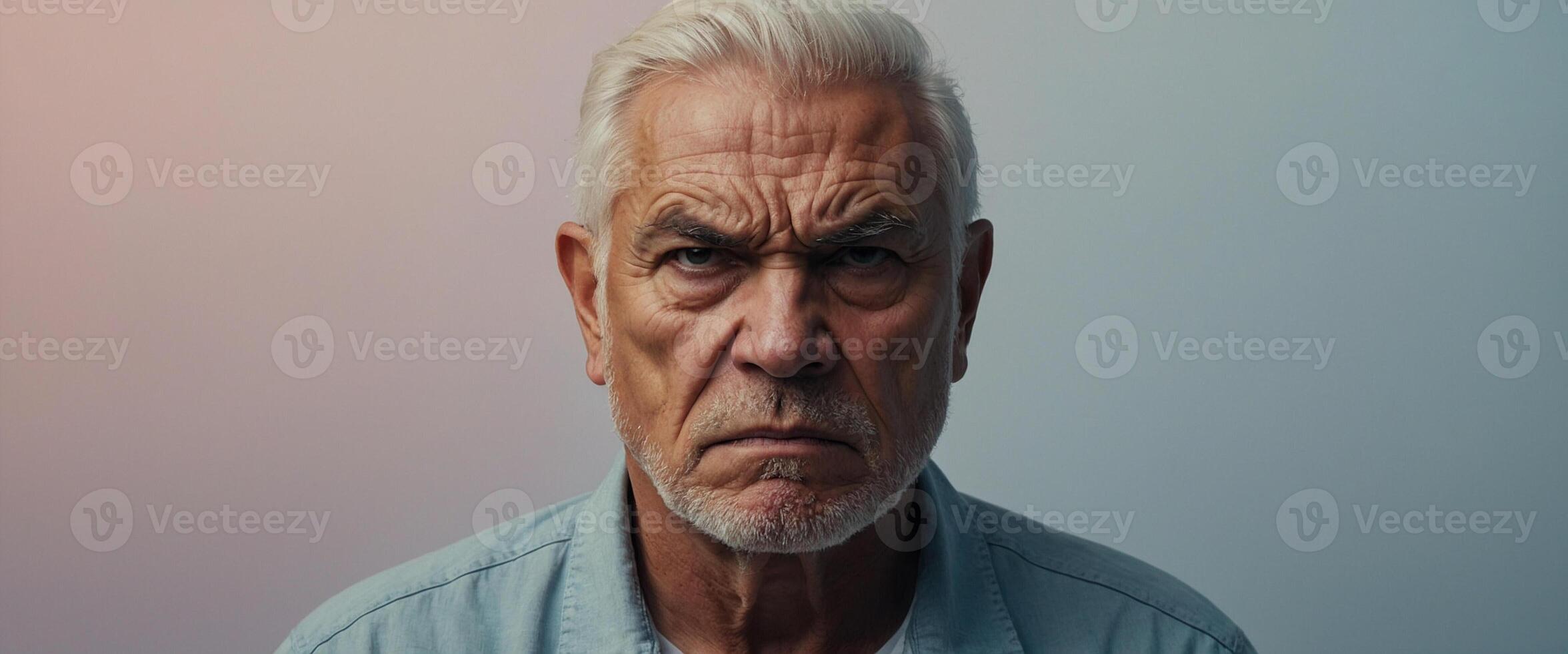 An older man with a serious expression photo
