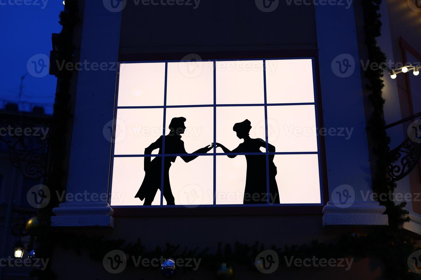 Silhouetted Romance Captured Behind a Window at Dusk, A Perfect Blend of Love and Atmosphere photo