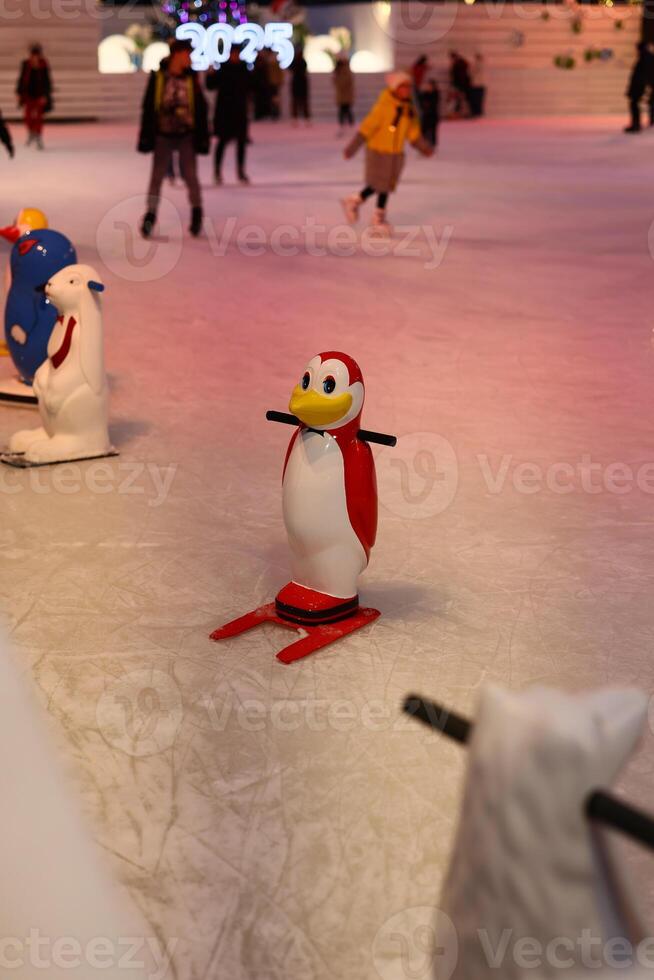 Experience an enchanting Ice Skating Wonderland complete with delightful Penguin Figures photo