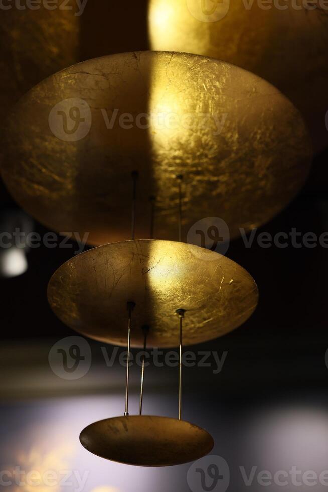 An Artistic Representation of Abstract Golden Discs Interconnected by Linear Elements photo