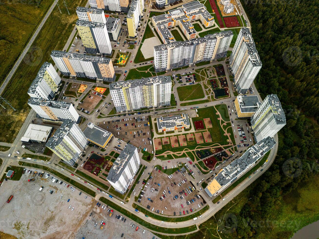 Aerial View of a Modern Residential Complex Highlighting Green Spaces and Design Features photo