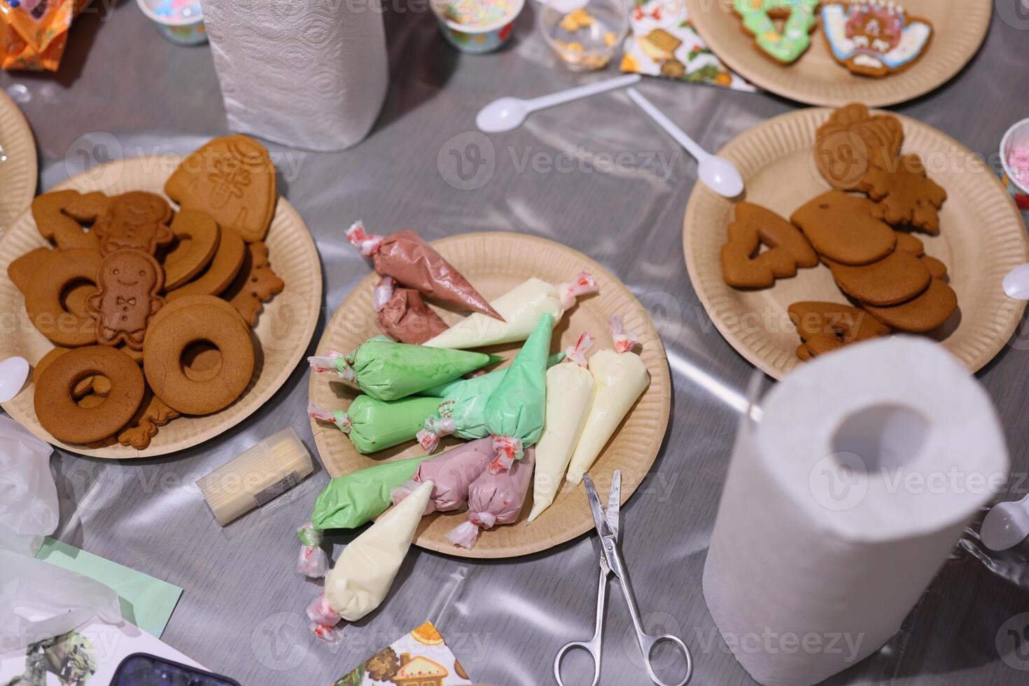 A delightful Festive Cookie Decorating Station filled with vibrant icing and fun shapes photo