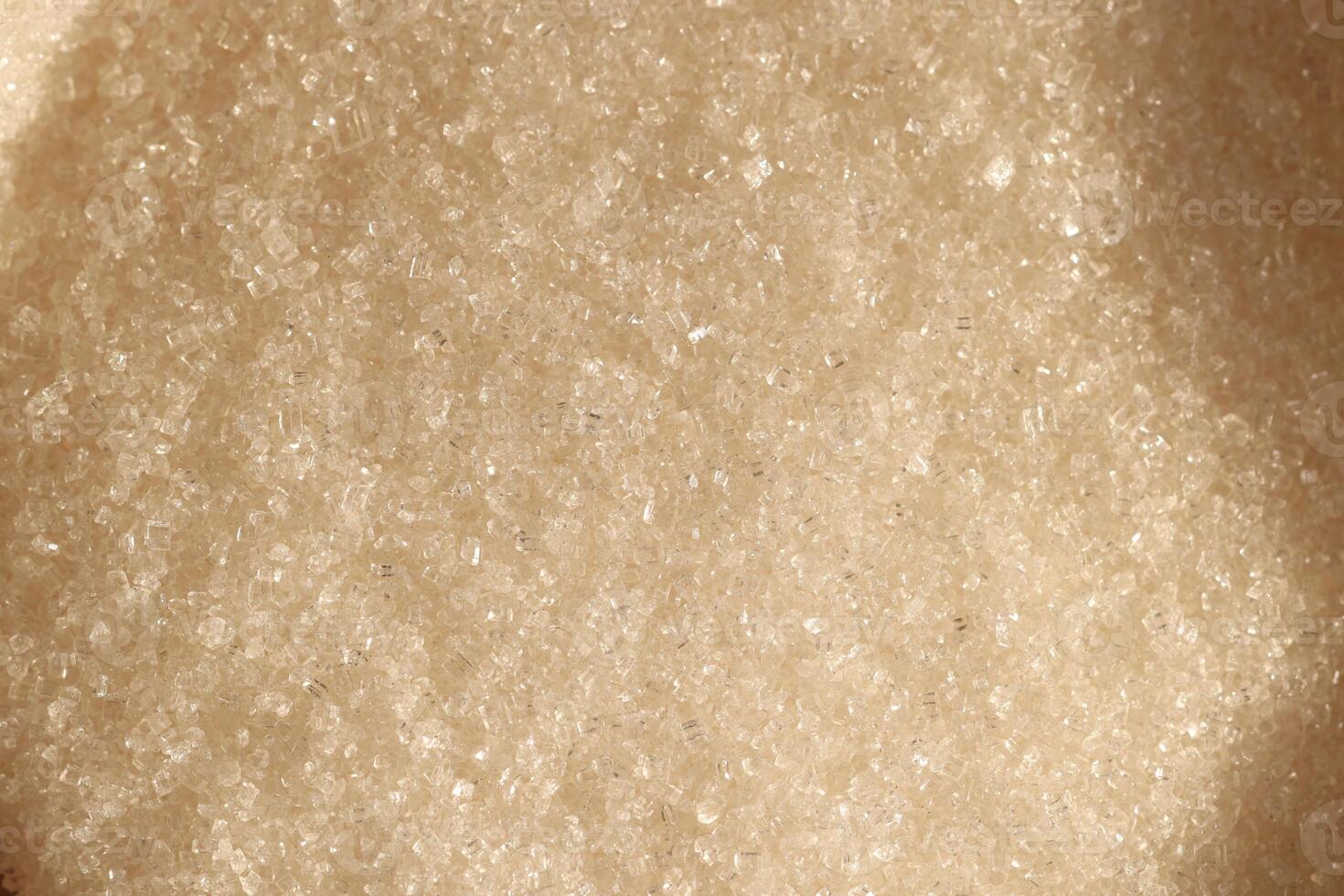 Closeup of granulated brown sugar, highlighting its fine texture and unique qualities photo
