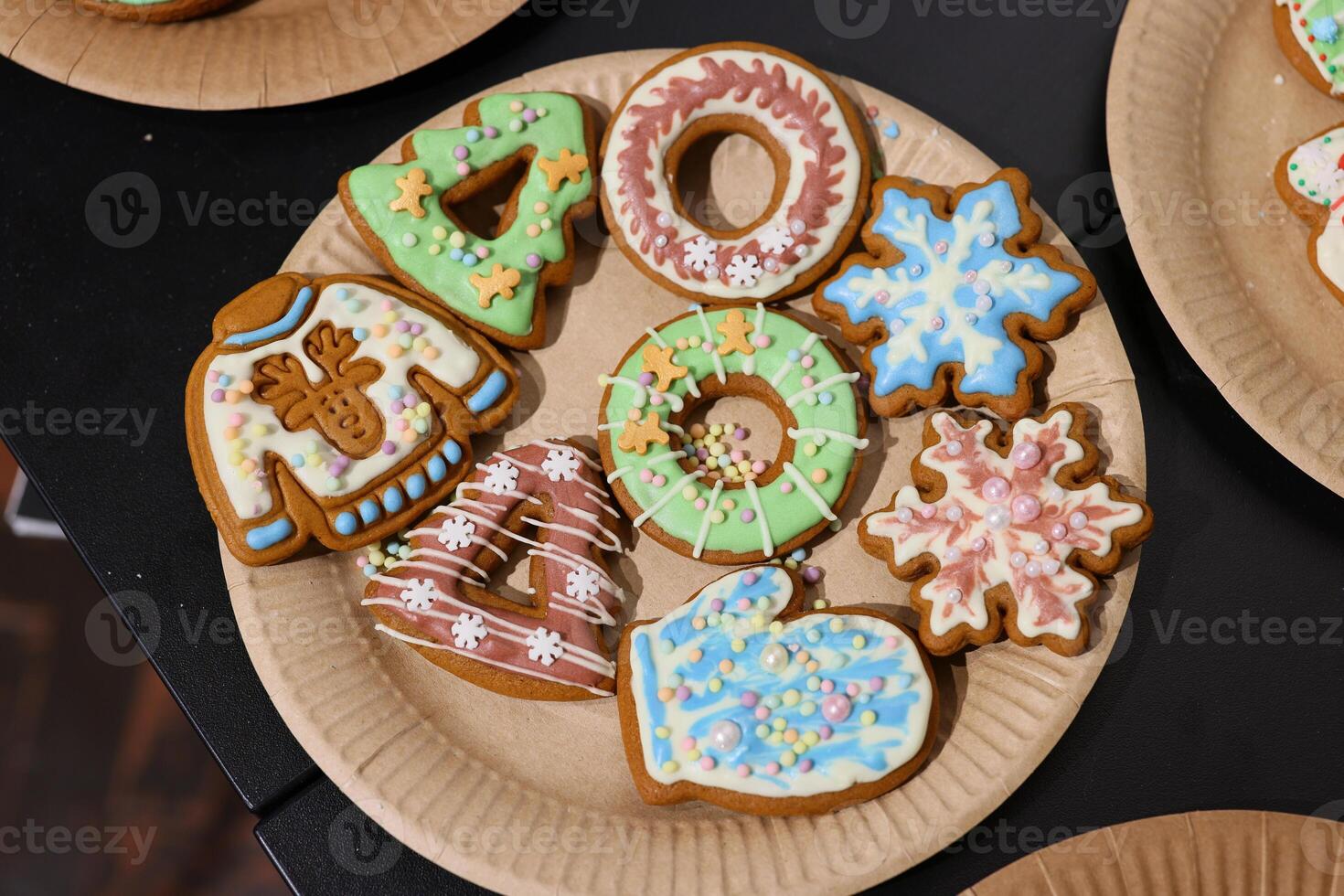 Festively Decorated and Beautifully Crafted Gingerbread Cookies Arranged on a Plate photo
