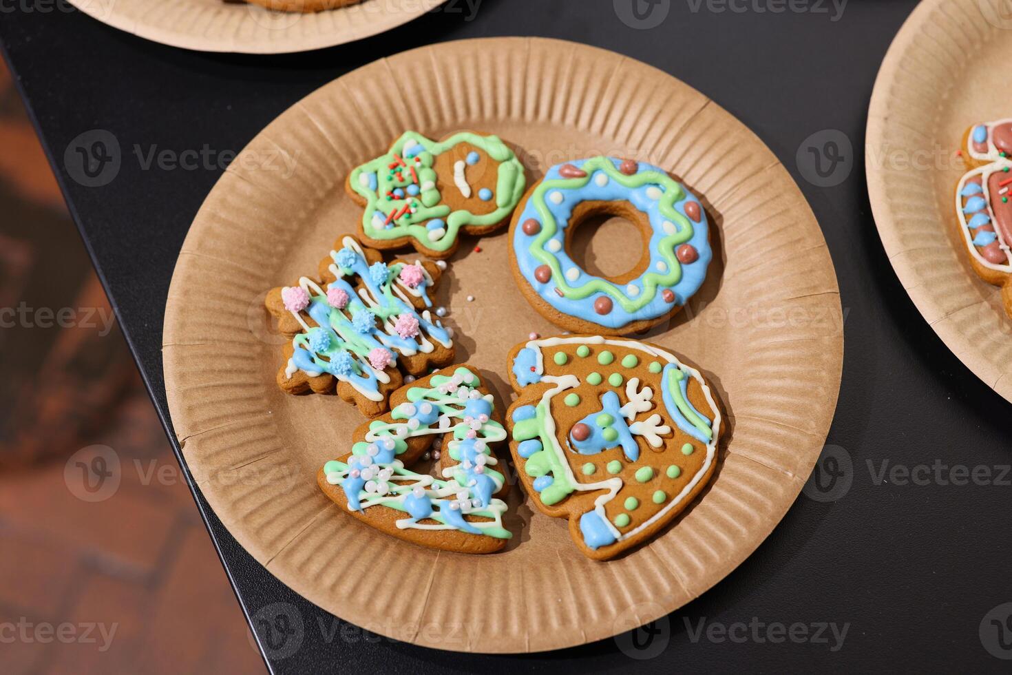 A beautiful plate of Decoratively Iced Holiday Cookies that are perfect for any occasion photo