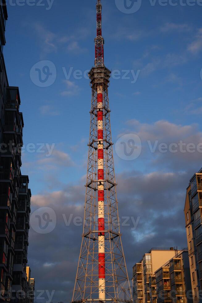 Behold the Amazing Tokyo Tower Standing Tall Against the Expansive Blue Sky Above photo