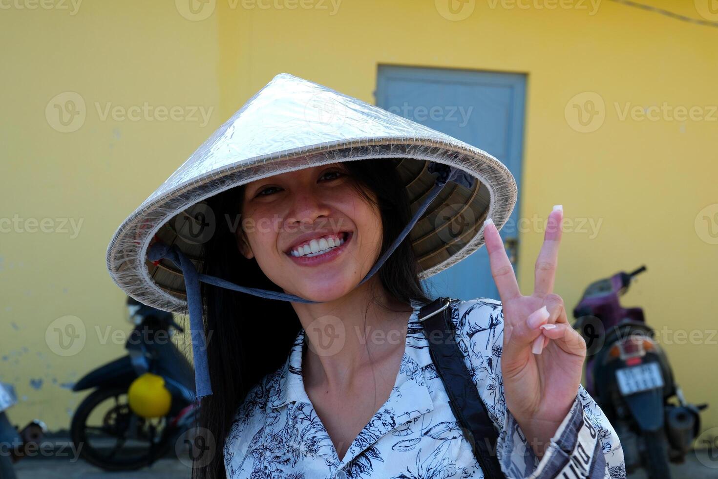 Portrait of Vietnamese girl traditional red dress,Beautiful young asian woman wearing Vietnam photo