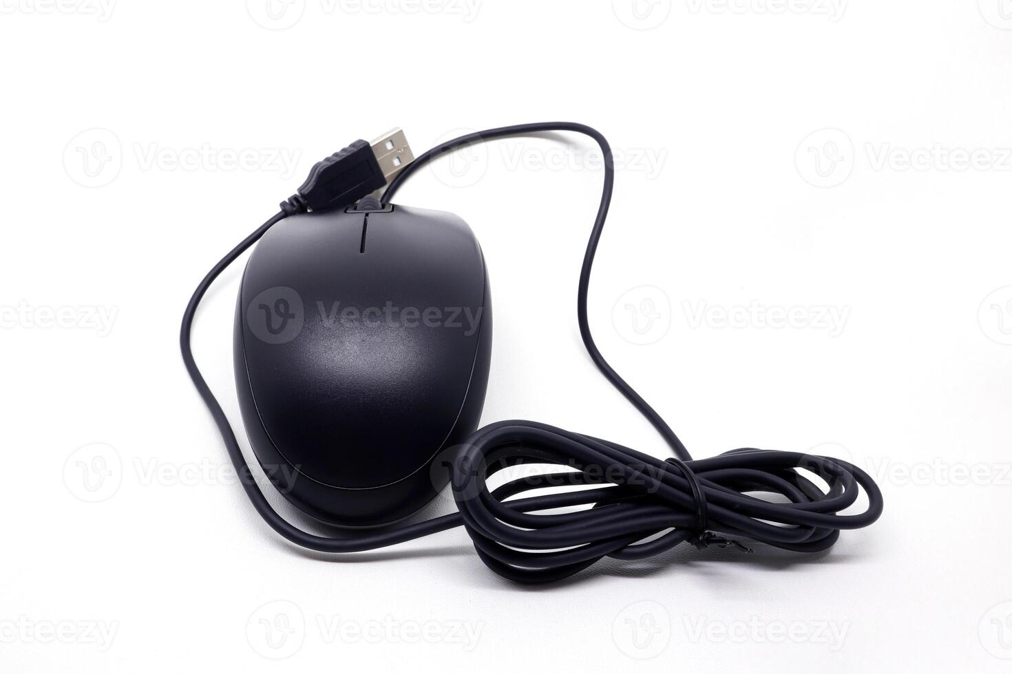 A black computer mouse with a cord attached to it photo
