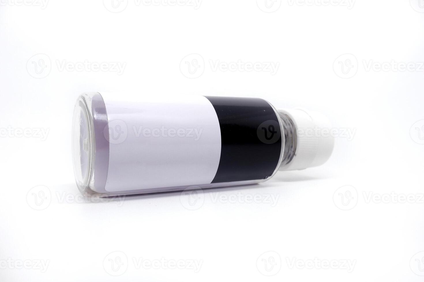 A white and black bottle with a black stripe photo