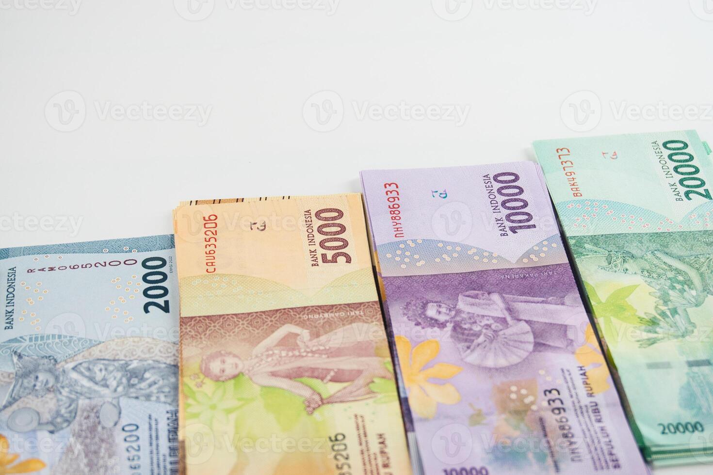 Colorful Indonesian Rupiah Banknotes Arranged in an Increasing Value Order photo