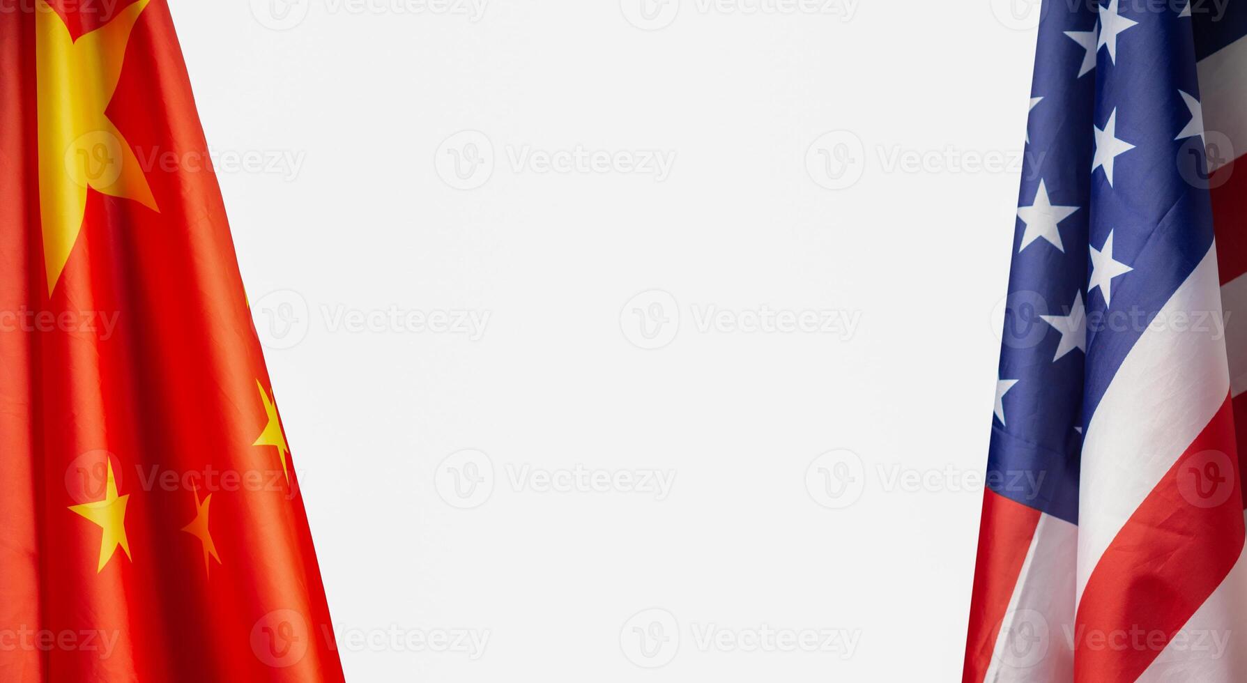 The American and Chinese flags are on a white background photo