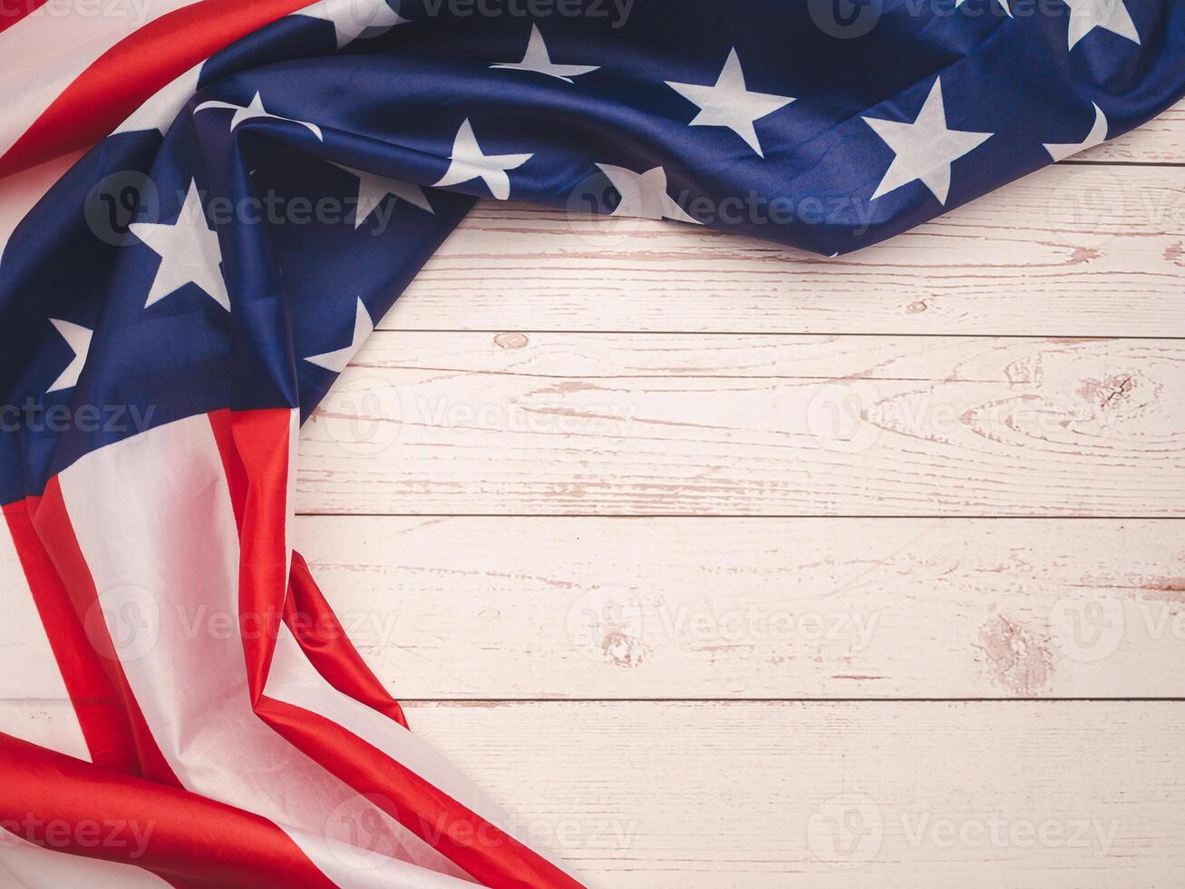 Top view of the American flag on a wooden table photo