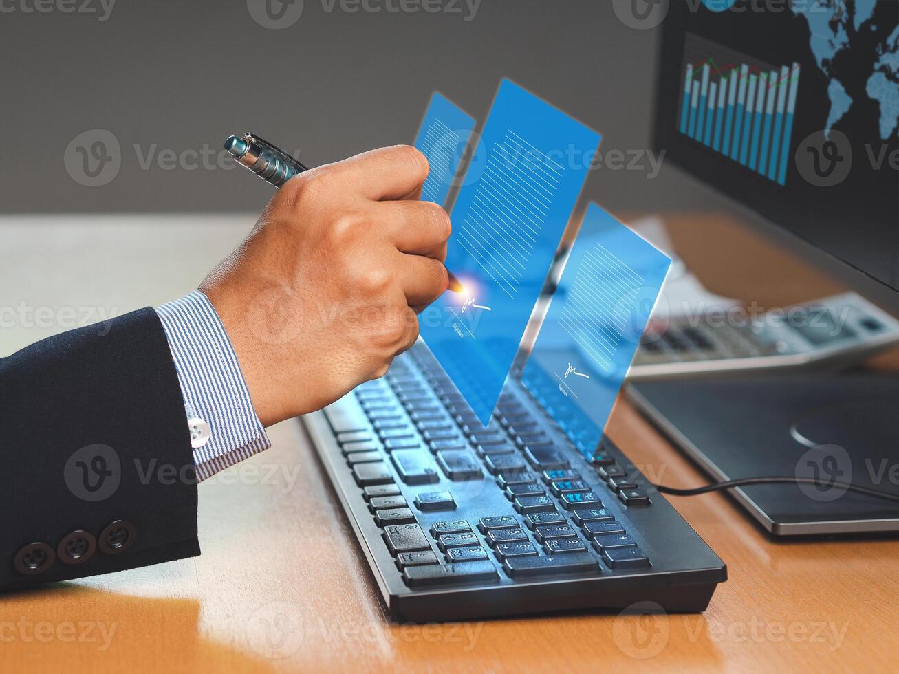 Electronic signature. A businessman uses a pen to sign electronic documents on digital documents on a virtual screen photo