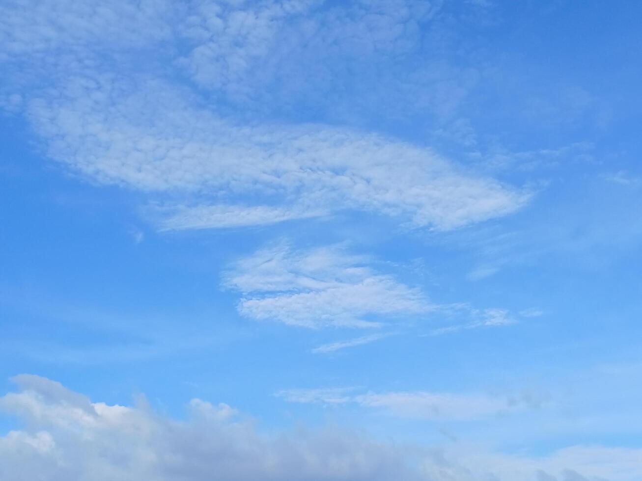 White clouds in sky photo