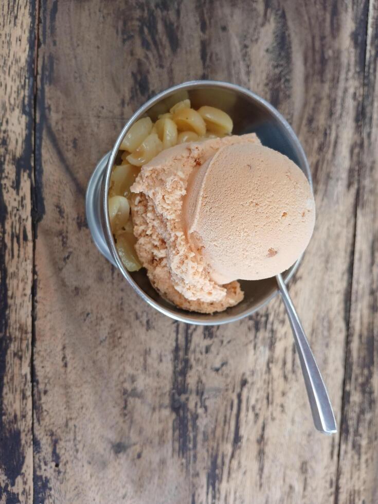 Ice cream in stainless steel cup photo