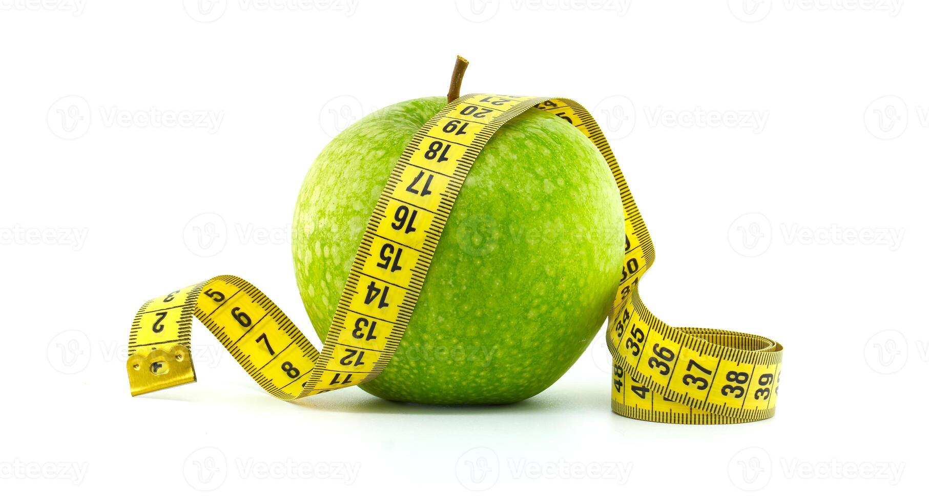 Healthy Choices Green Apple with Measuring Tape Isolated on White Background photo