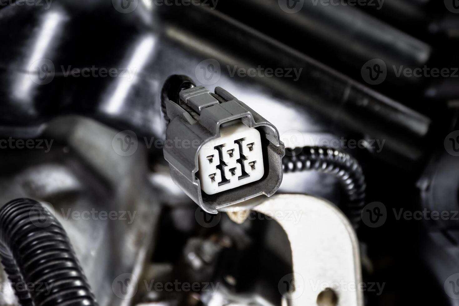 Close up of automotive electrical connector with six pin socket , Automotive parts concept photo