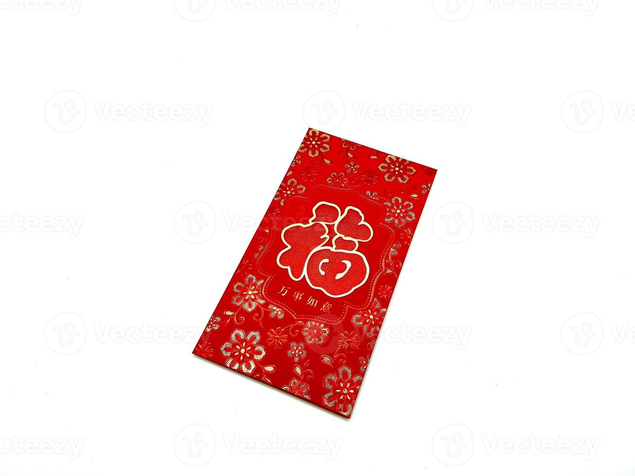 A vibrant red envelope or angpao or angpau or red packet used for gifting money during celebrations with gold floral patterns and a Chinese character for good fortune or prosperity photo