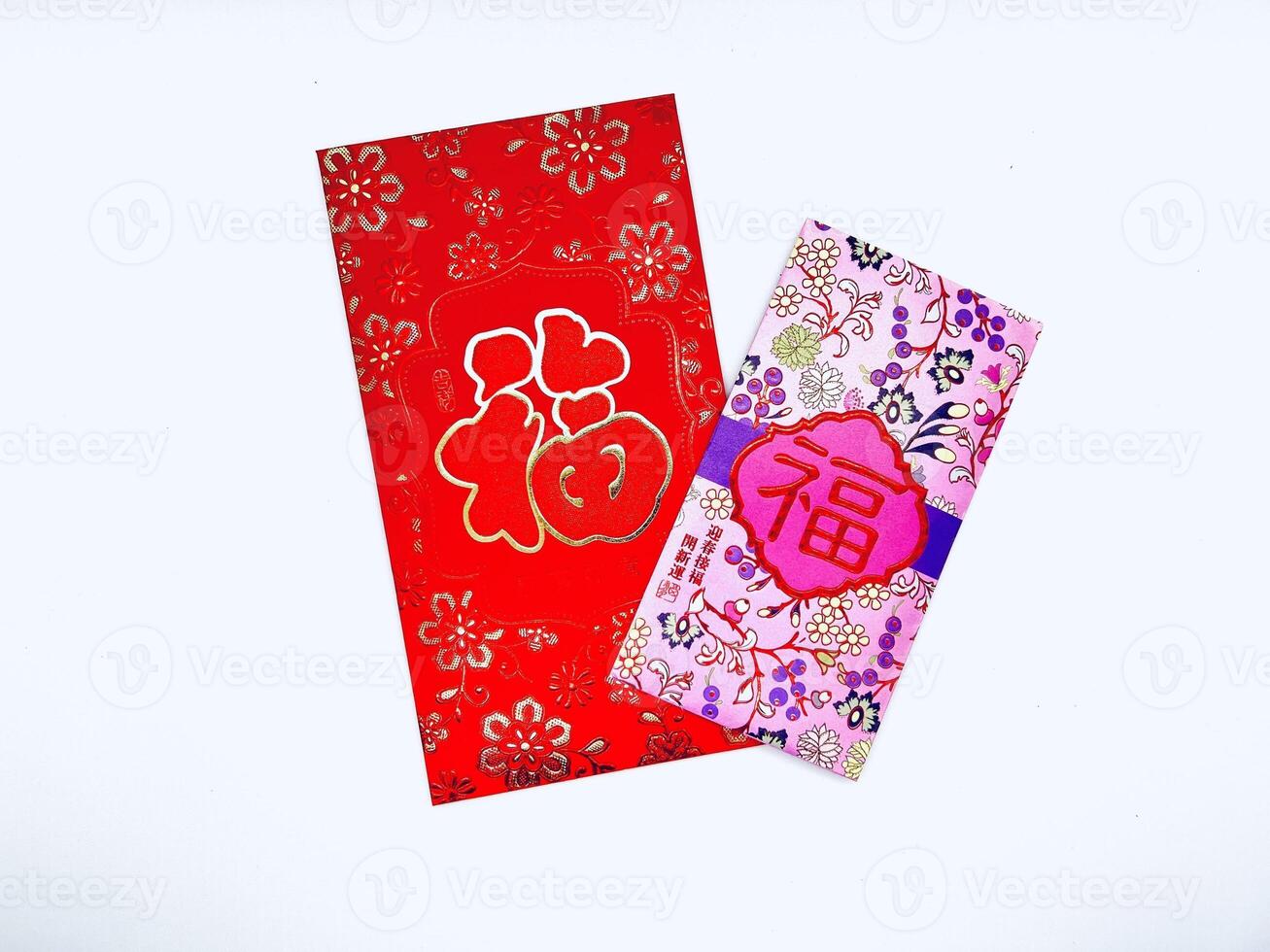 A vibrant red envelope or angpao or angpau or red packet used for gifting money during celebrations with gold floral patterns and a Chinese character for good fortune or prosperity photo