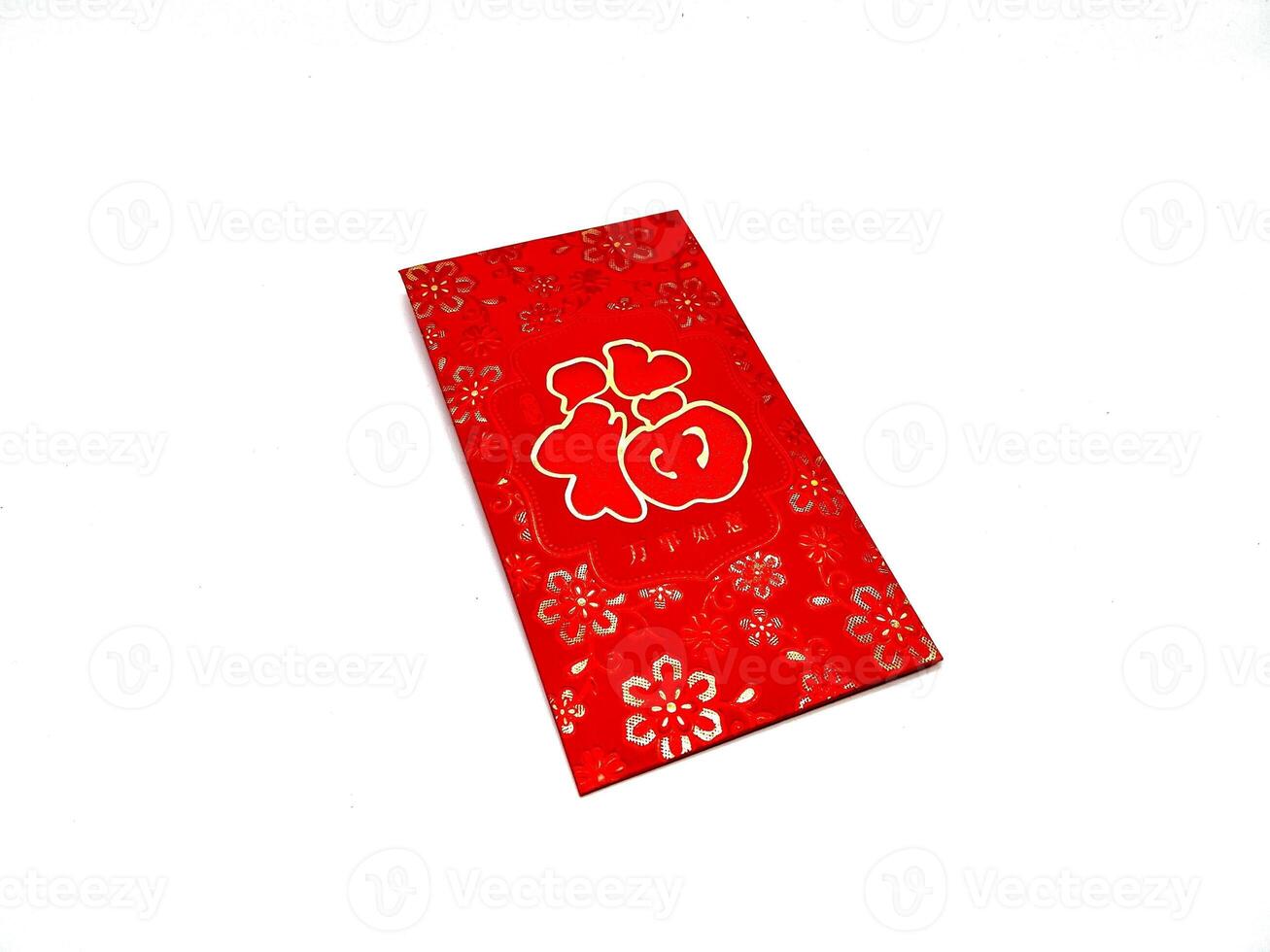 A vibrant red envelope or angpao or angpau or red packet used for gifting money during celebrations with gold floral patterns and a Chinese character for good fortune or prosperity photo