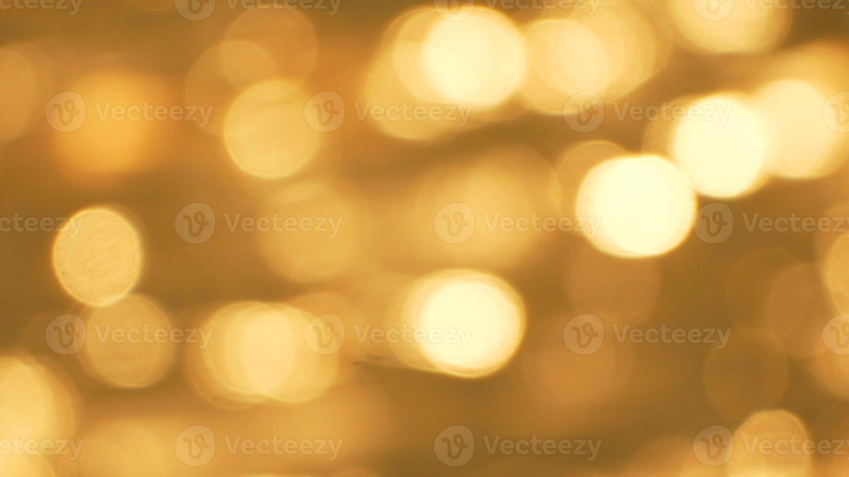 Lights Bokeh Background Abstract - Golden Blurred Background with Circular Lights photo
