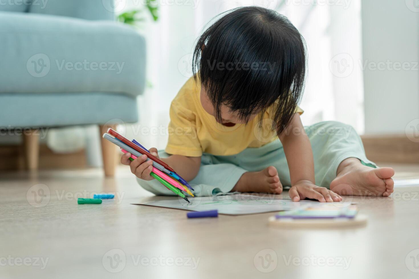 Happy Asia children playing learning paint on paper. Activity, development, IQ, EQ, meditation, brain, muscles, essential skills, family having fun spending time together. Holiday photo