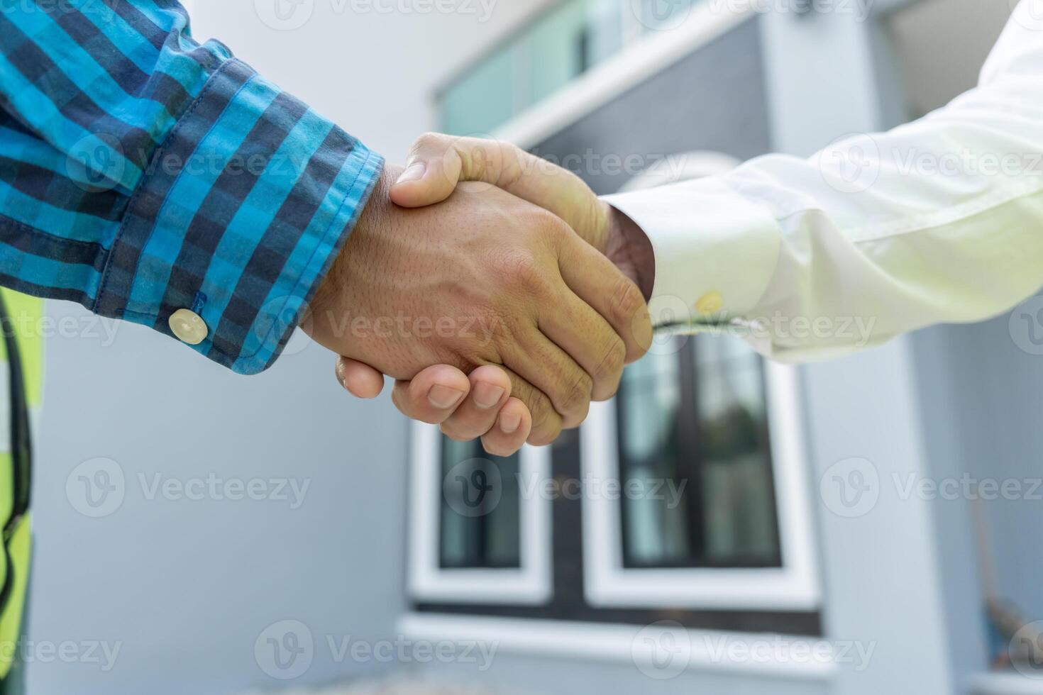 Construction team hands shaking greeting start up plan new project contract in office center at construction site, industry ,architecture, partner, teamwork, agreement, property, contacts. photo