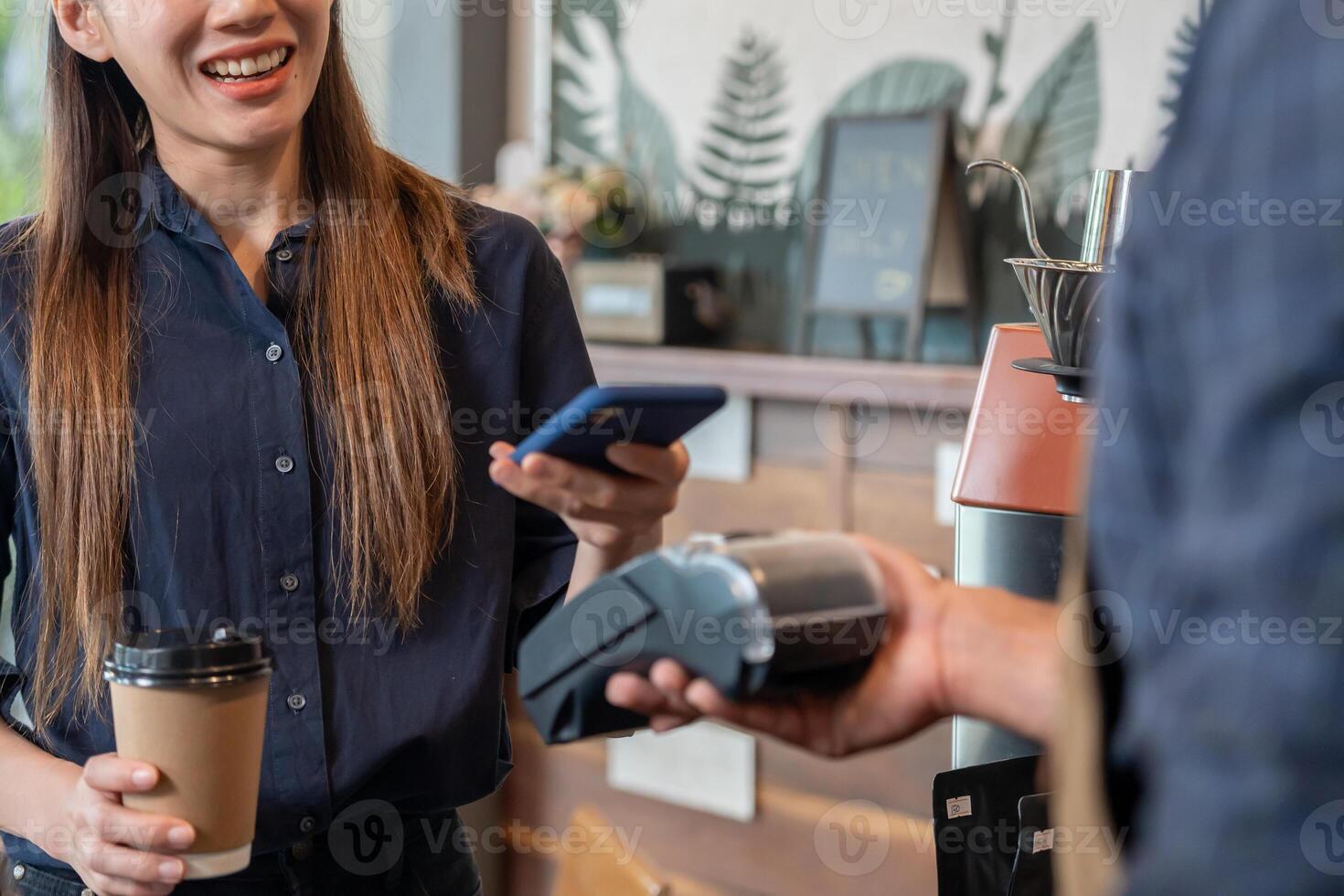 Woman use smartphone to scan QR code for order menu in cafe restaurant with a digital delivery. Choose menu and order accumulate discount. E wallet, technology, pay online, credit card, bank app. photo