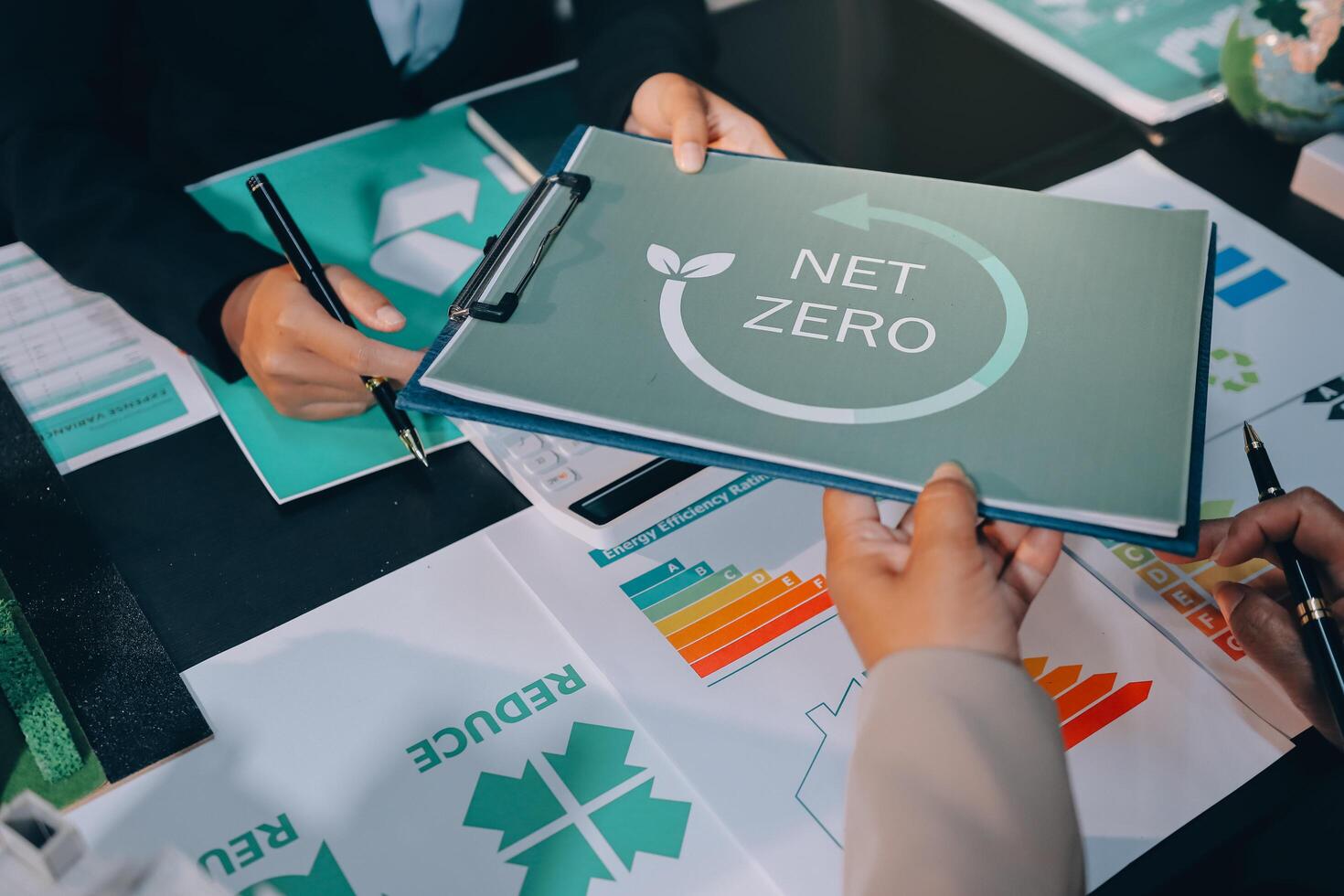 Carbon offset price report CO2 emission. Future growth Net zero waste in ESG ethical SME office protect climate change global warming social issues project. Group of asia people Eco friendly SDGs plan photo