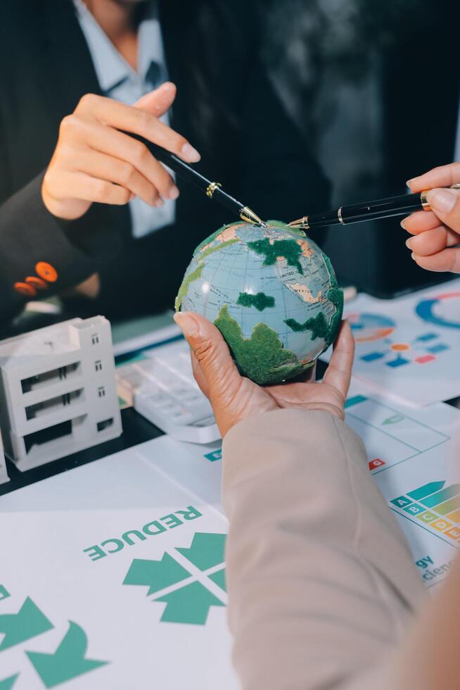 Carbon offset price report CO2 emission. Future growth Net zero waste in ESG ethical SME office protect climate change global warming social issues project. Group of asia people Eco friendly SDGs plan photo