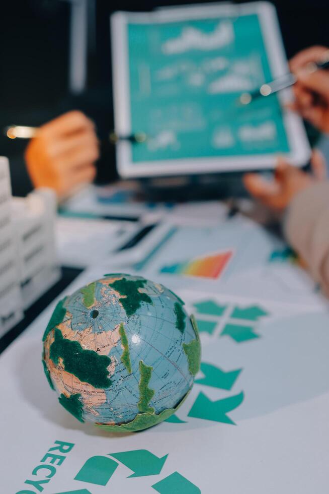Carbon offset price report CO2 emission. Future growth Net zero waste in ESG ethical SME office protect climate change global warming social issues project. Group of asia people Eco friendly SDGs plan photo