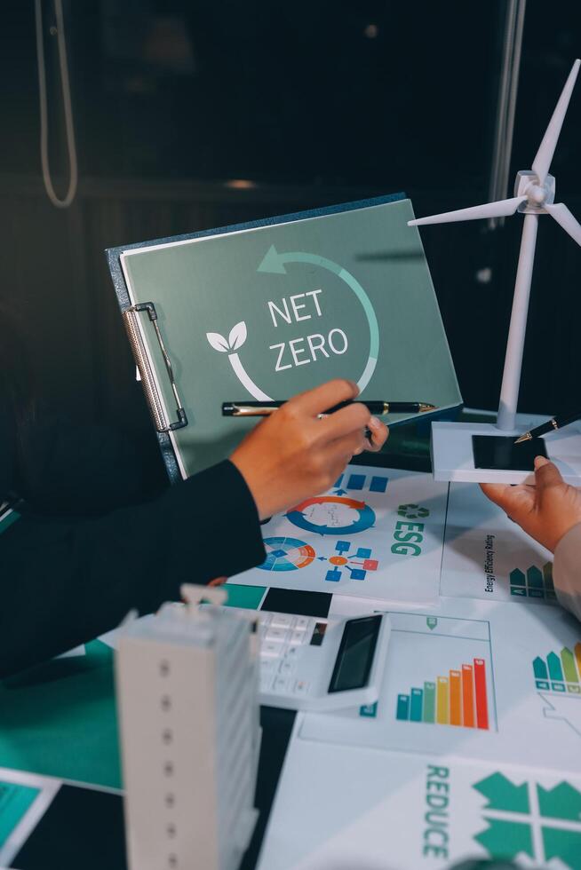 Carbon offset price report CO2 emission. Future growth Net zero waste in ESG ethical SME office protect climate change global warming social issues project. Group of asia people Eco friendly SDGs plan photo