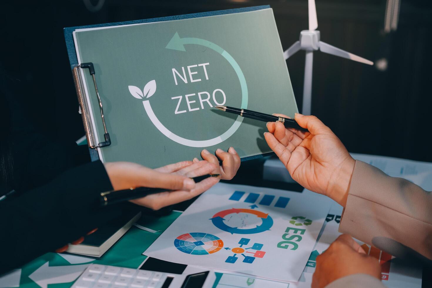 Carbon offset price report CO2 emission. Future growth Net zero waste in ESG ethical SME office protect climate change global warming social issues project. Group of asia people Eco friendly SDGs plan photo