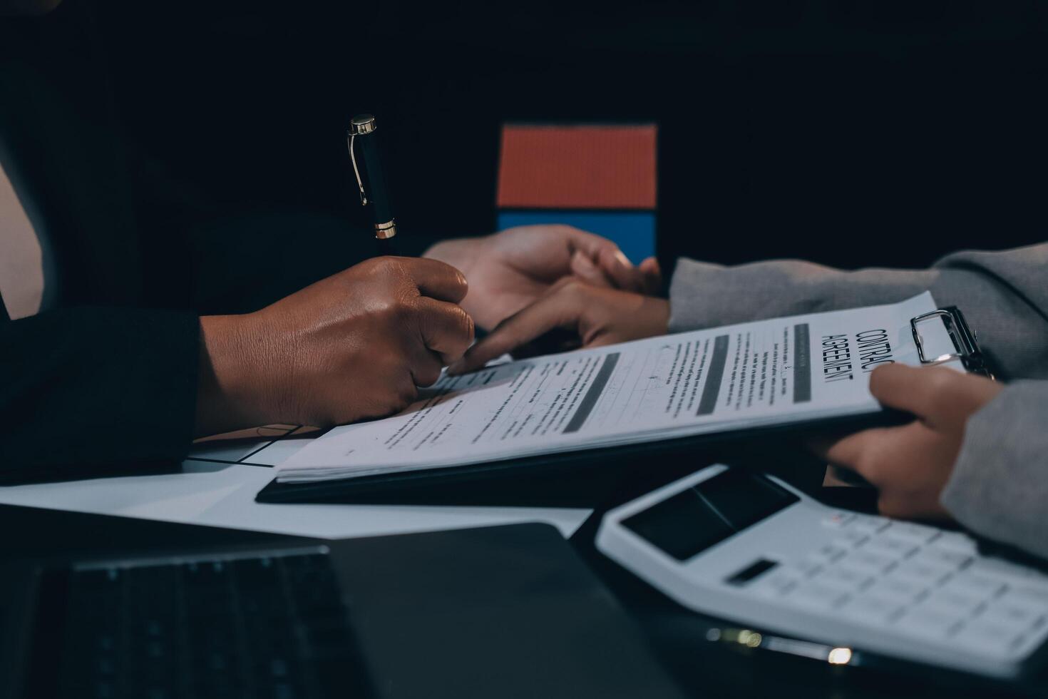 Close up Business people or Real Estate agent explain signing agreement for sale house to client. Property, Insurance, Broker concept. photo