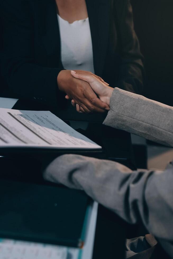 Close up Business people or Real Estate agent explain signing agreement for sale house to client. Property, Insurance, Broker concept. photo