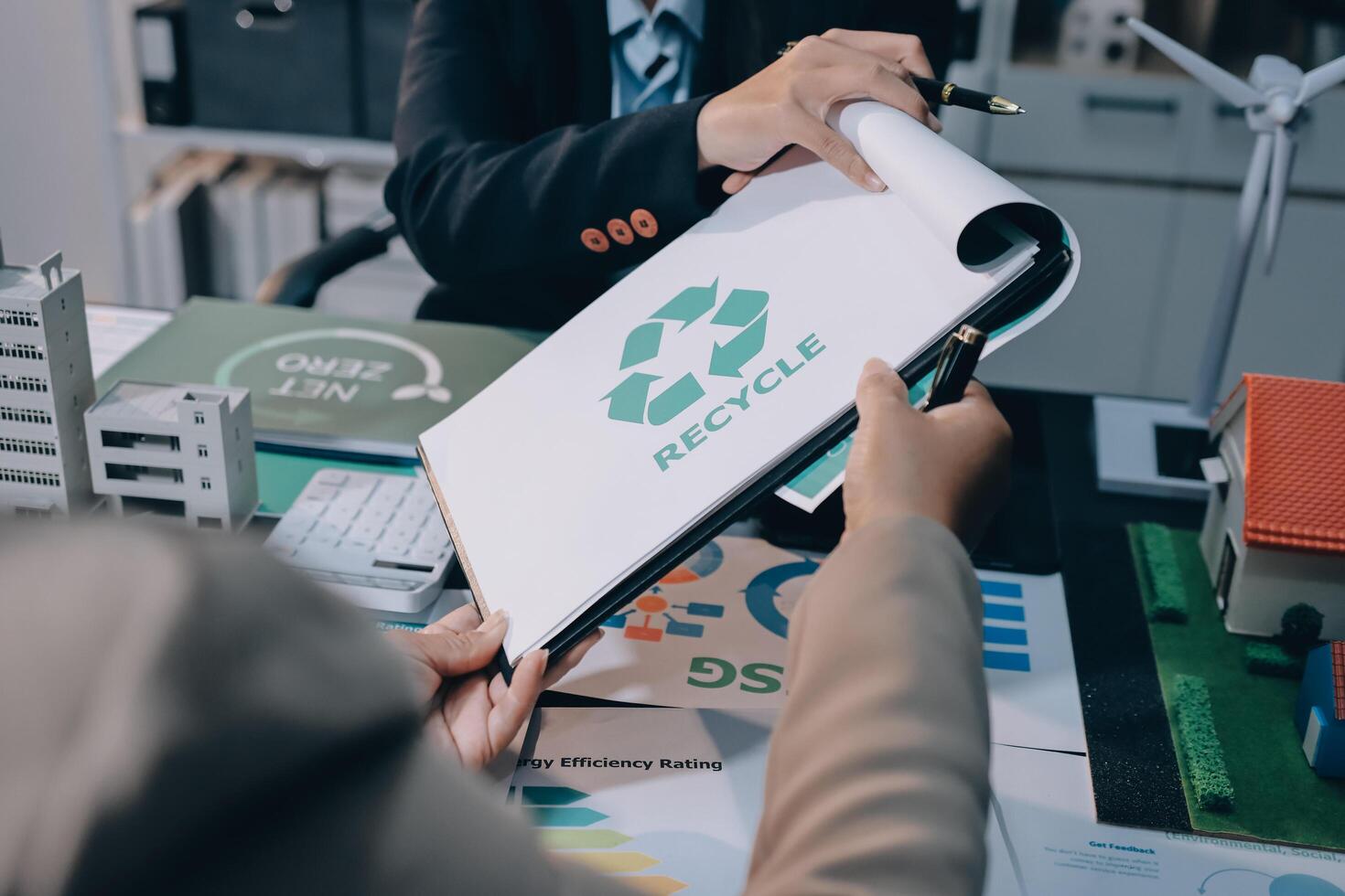 Carbon offset price report CO2 emission. Future growth Net zero waste in ESG ethical SME office protect climate change global warming social issues project. Group of asia people Eco friendly SDGs plan photo