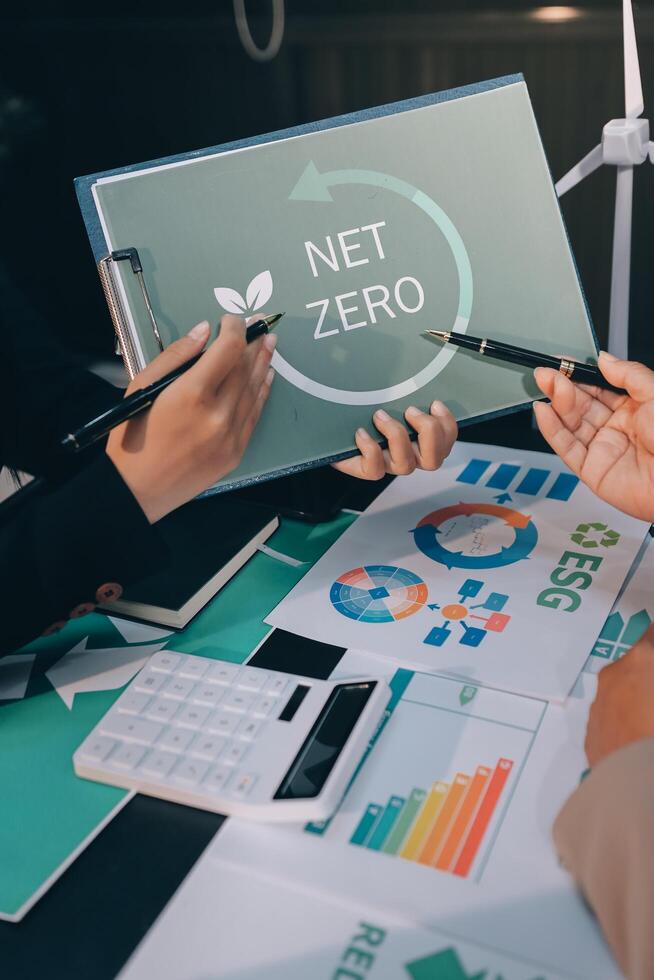 Carbon offset price report CO2 emission. Future growth Net zero waste in ESG ethical SME office protect climate change global warming social issues project. Group of asia people Eco friendly SDGs plan photo