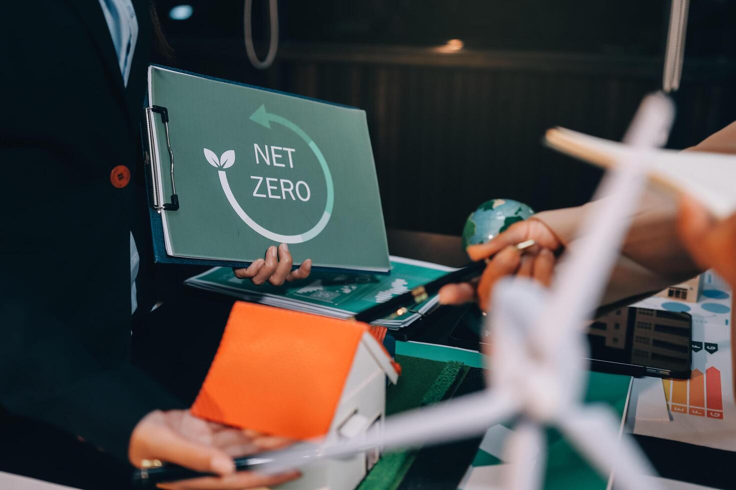 Carbon offset price report CO2 emission. Future growth Net zero waste in ESG ethical SME office protect climate change global warming social issues project. Group of asia people Eco friendly SDGs plan photo