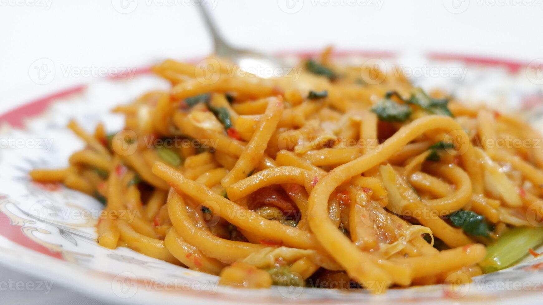 stir fried noodles with vegetables, mie gomak indonesian food, gomak noodles photo