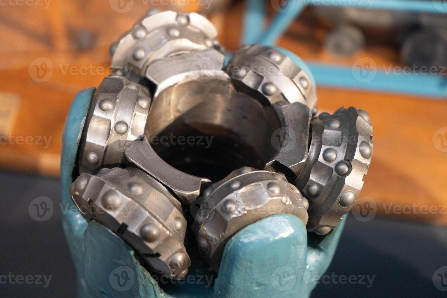 Drill bits. Perforator button for water wells. Tricone bit. Equipment for water and coal wells. Drilling photo