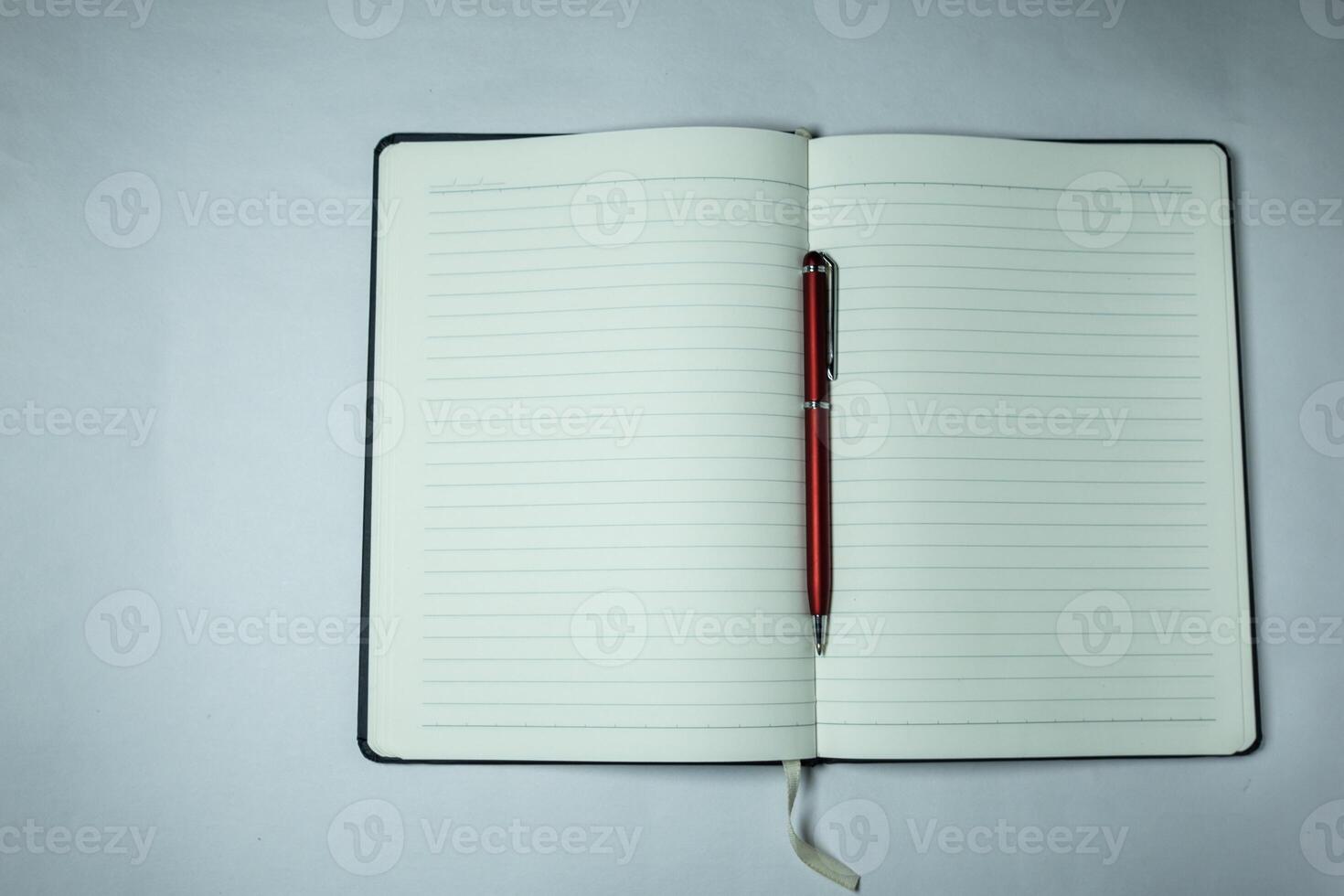 Blank Notebook with Pen image photo
