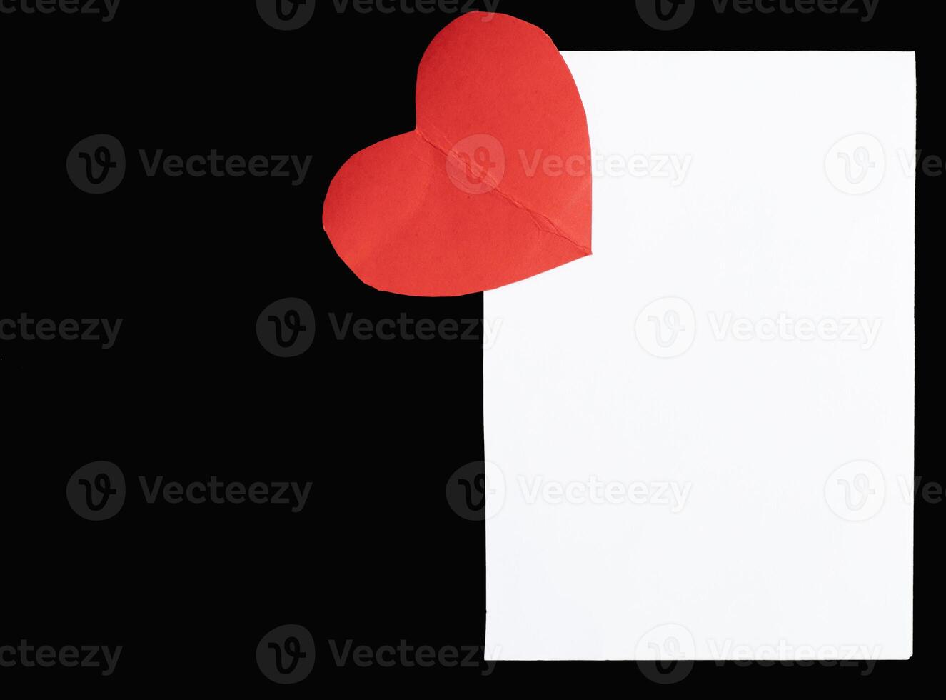 Valentine's day card concept. Paper cut red heart. photo