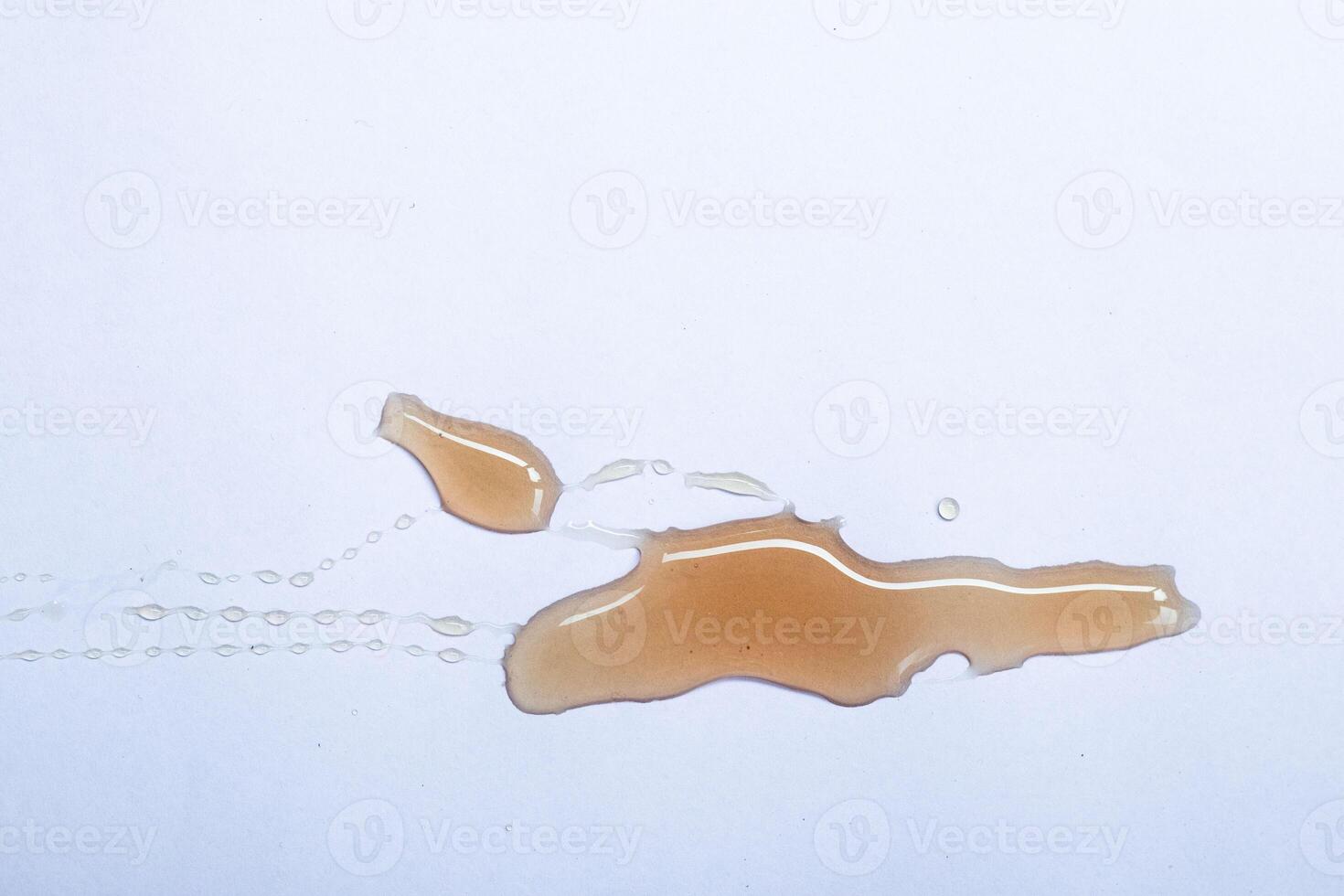 Flowing honey isolated on white background. Ideal for packaging. photo