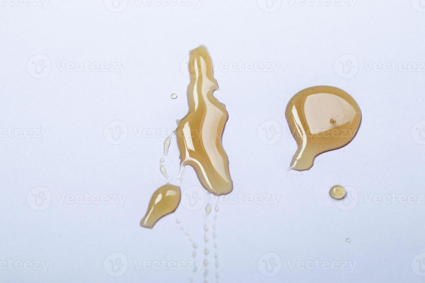 Honey isolated on white, top view photo