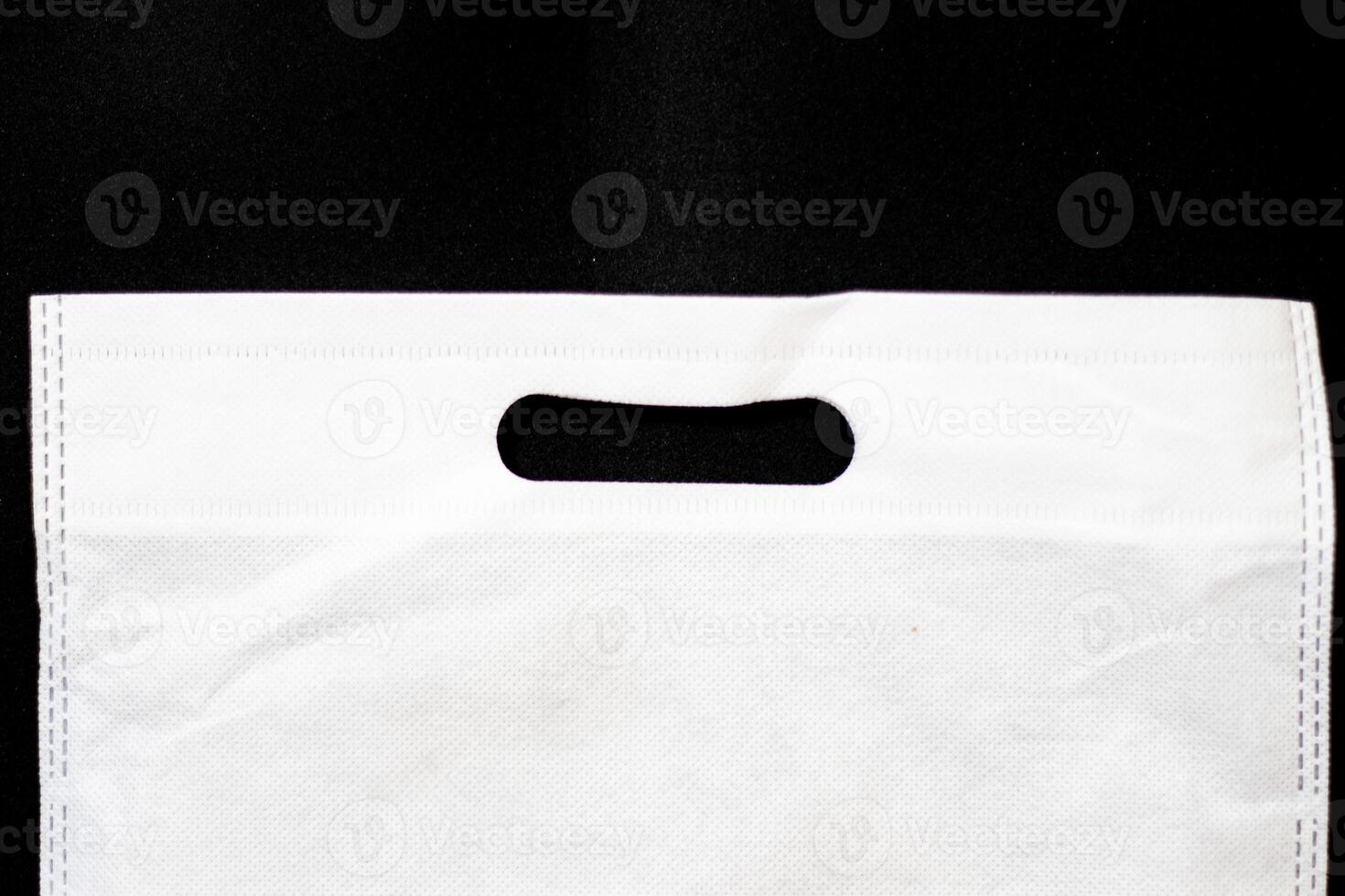 plastic bag on black background photo