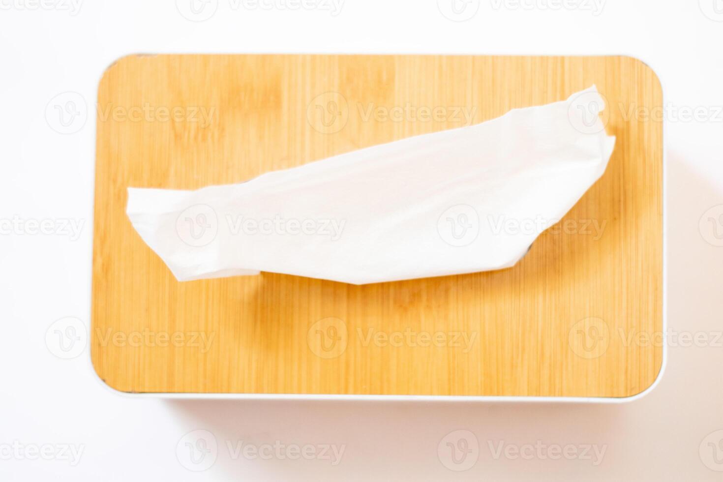 Holder with paper tissue isolated on white photo