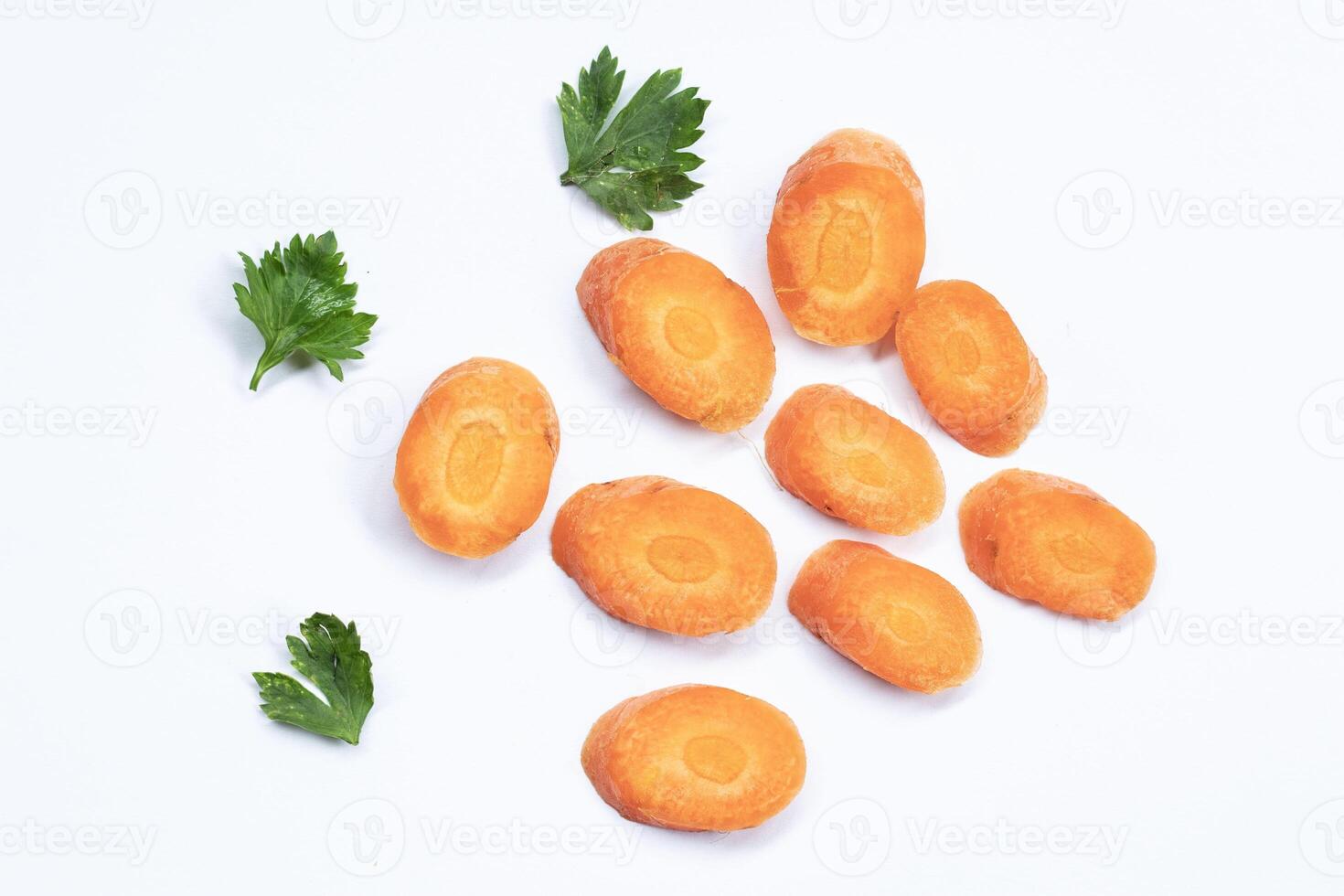 Carrot slices isolated. Carrots with parsley on a white background. Perfect retouch carrot slices isolated. Full depth of field. photo