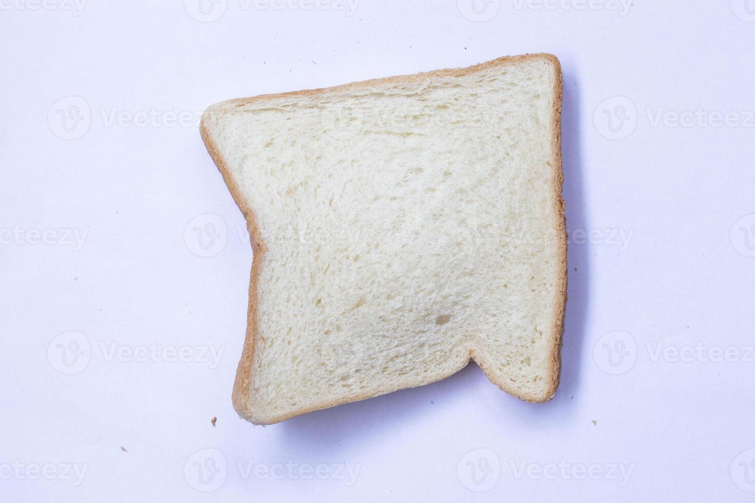 Slices of toast isolated on white background. Top view, flat photo